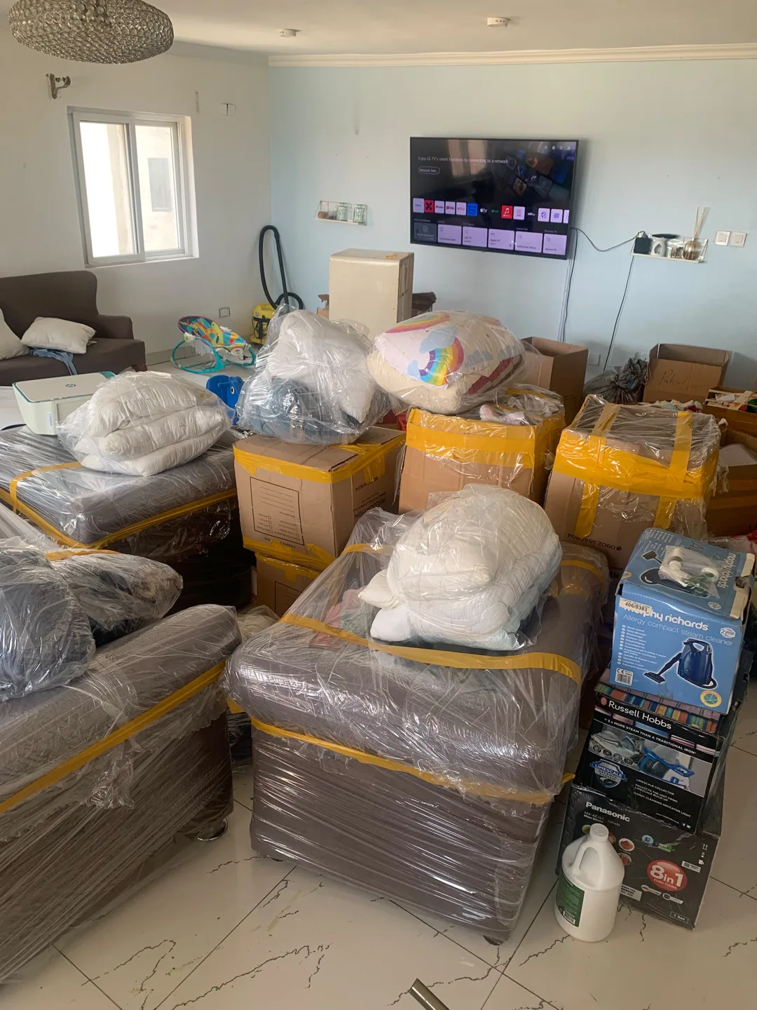 Packed household belongings grouped for moving day